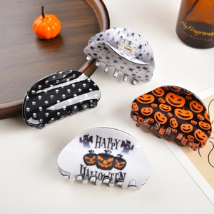 Set of Halloween shark hair claws with skull pumpkin and spider web patterns