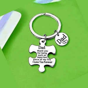 Polished stainless steel puzzle keychain with 'Thank You Dad' laser engraving for Father's Day