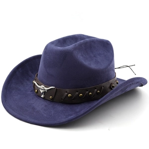 Close-up of suede cowboy hat with vintage bull head emblem and leather strap detail