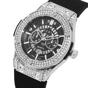 Men's silver rhinestone watch with black rubber strap and镂空 skeleton dial design