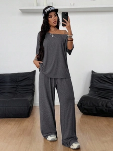 Women's casual grey two-piece set featuring off-shoulder top and wide-leg trousers
