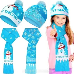 Detail of blue LED knitted hat and scarf set with snowman pattern and Let It Snow text
