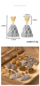 Detailed view of geometric textured metal earrings with dimensions and weight specs
