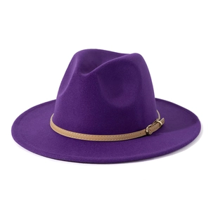 Detail of a deep purple wide brim fedora hat featuring a khaki belt with a gold buckle