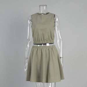 Detail of olive green cotton linen set featuring elastic pleated waist and hem texture
