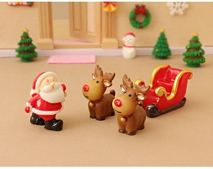 Miniature resin Santa Claus with reindeer and red sleigh for Christmas micro landscapes