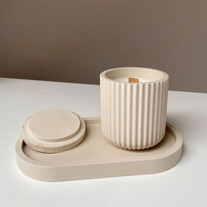 Minimalist cream resin candle jar set with ribbed texture, lid and oval tray base