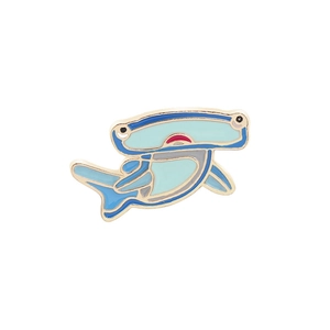 Cartoon hammerhead shark enamel pin with gold plating and blue colors on white background