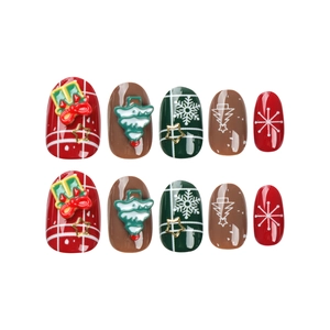 Christmas press-on nails set with red and green festive patterns and star 3D decorations