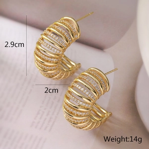 Detail view of 18K gold plated C-shaped earrings with zircon measuring 2.9cm by 2cm
