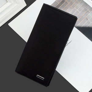 Detail of slim black men's long wallet featuring matte texture and silver metal bar accent