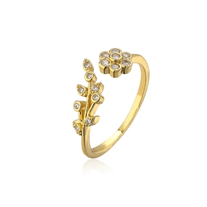 Detail of 18K gold plated copper ring with floral zircon pattern and adjustable band