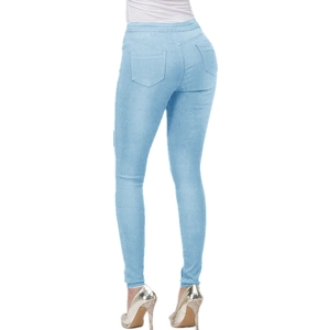 Detailed back view of light blue skinny jeans highlighting push-up fit and denim texture
