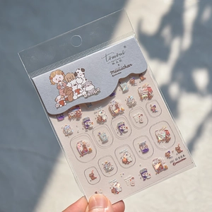 Detail of cute dog and bear cartoon nail art stickers with glossy iridescent finish