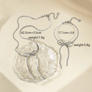 Silver stainless steel bow snake chain jewelry set including necklace and bracelet piece