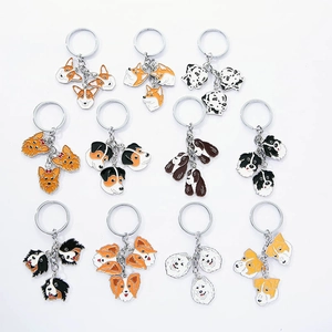 Variety set of 12 cute cartoon dog breed enamel keychains in various colorful styles