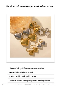 Close-up of heart-shaped stainless steel earrings with 18K gold plating finish