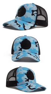Macro detail of breathable mesh and camo canvas on this blue outdoor baseball cap