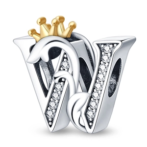 Detailed view of silver letter W charm with a gold crown and sparkling crystal inlays