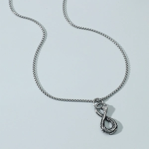 Silver snake infinity pendant necklace with textured detail and box chain on grey background