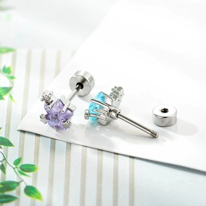 Star-shaped stud earrings with purple and blue zircon in silver stainless steel