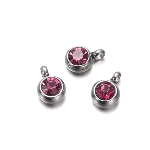 Three silver stainless steel earring components with round pink zircon gemstones charms