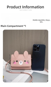 Mini pink rabbit shoulder bag for kids with ears shown next to a smartphone for scale