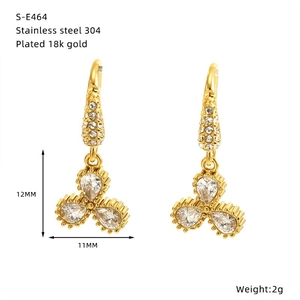 Detail of 18k gold plated 304 stainless steel earrings with sparkling zircon stones