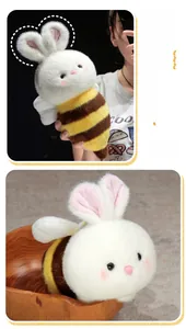 Detail of creative bunny bee plush toy with soft wings and textured fur in a wooden bowl