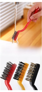 Detailed view of 3-piece L-shaped stove cleaning brushes with steel bristles for gaps