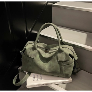 Retro sage green large capacity travel bag with matte suede texture and shoulder strap