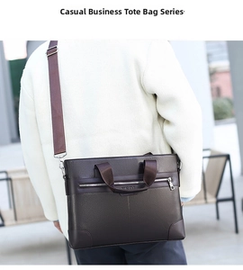 Detail of dark brown leather business briefcase with lychee texture and front zipper