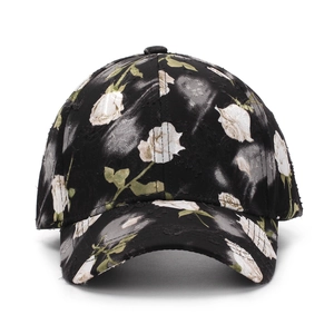 Casquette de baseball noire à imprimé floral blanc avec des détails usés vintage