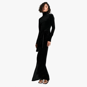 Detailed view of women's black velvet bodycon dress with mock neck and waist tie belt