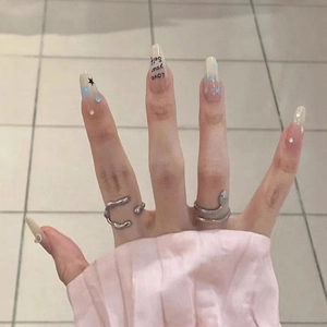 Minimalist silver wavy and snake ring set with white gradient star nail art