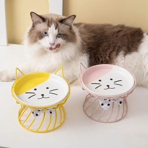 Elevated ceramic cat bowl set with ear-shaped metal stand for neck protection