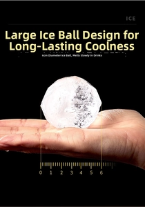 Detail showing a 6cm diameter large crystal clear ice ball for whisky and cold drinks