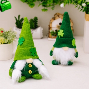 Macro detail of St. Patrick's Day gnomes with green shamrocks and soft felt texture