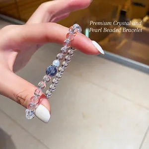 Bracelet élégant en perles de cristal blanc avec une perle et une perle marbrée bleue
