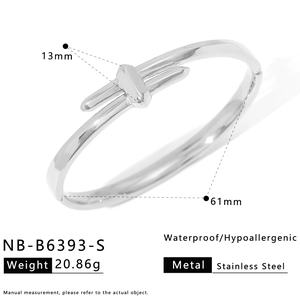 Detailed dimension guide for silver stainless steel bangle showing 61mm inner diameter