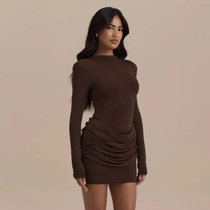 Detail of deep brown bodycon mini dress featuring ruched stacking and slim long sleeves