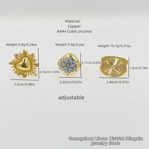 Detailed view of adjustable copper gold rings with snowflake and heart zirconia patterns