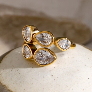 Detail of 18k gold plated irregular zircon open ring with five pear-cut stones