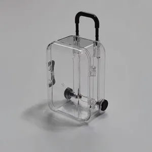 Transparent mini suitcase jewelry box with black handle and movable wheels