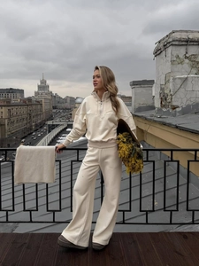 Women's cream half-zip sweatshirt set with high-waist wide-leg pants and matching scarf