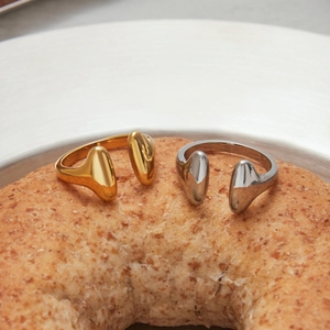 Minimalist streamlined stainless steel open rings in gold and silver finish