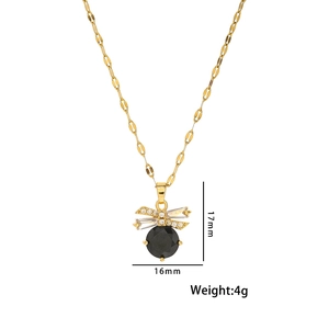 Detail of gold bow pendant with black gemstone and 17mm size specifications