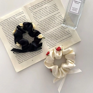 French rose floral scrunchies with long ribbons and satin bow details in beige and black