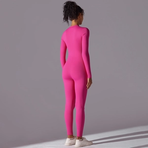 Rear view of rose pink long sleeve jumpsuit showing slim fit athletic silhouette