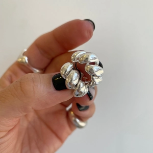 Minimalist 925 sterling silver twisted croissant dome ring with a polished woven texture